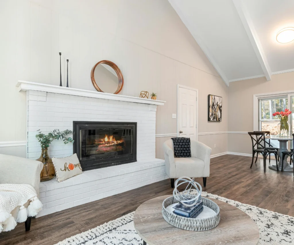 Fireplace With Black Brick Wall In White Room